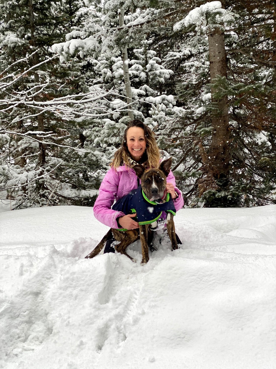Dr. Heather Corbin with Dog in Snow